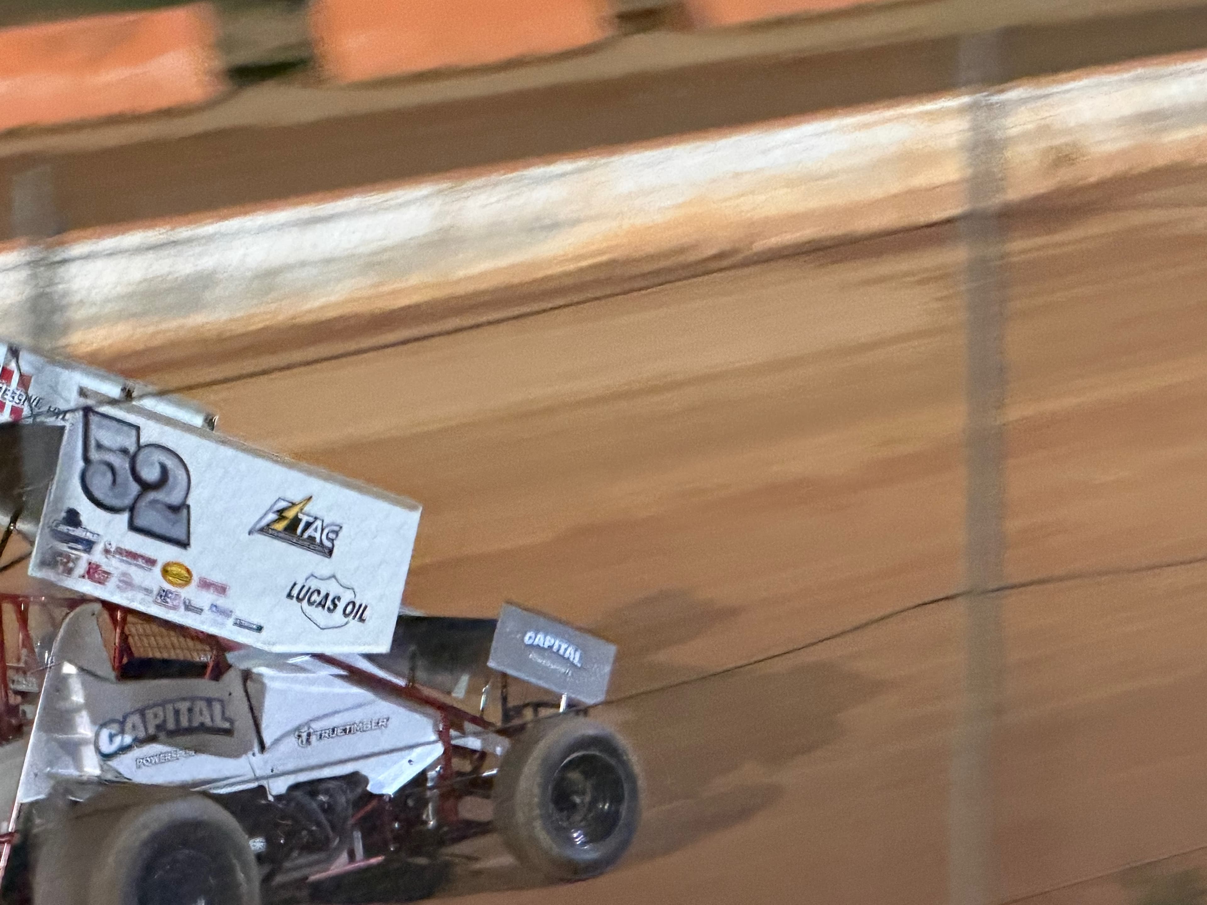 Tri-Area Electric sponsored #52 sprint car on dirt track