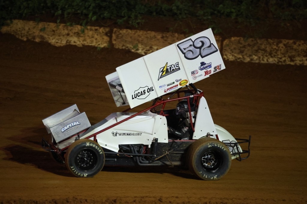 Tri-Area Electric sponsored #52 sprint car on dirt track
