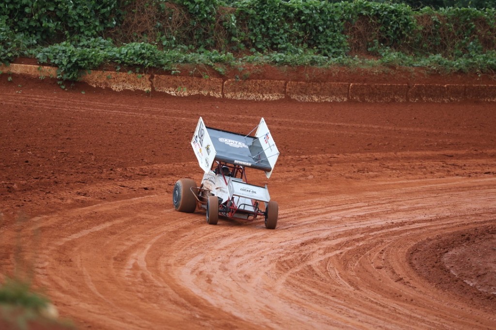 Tri-Area Electric sponsored #52 sprint car on dirt track