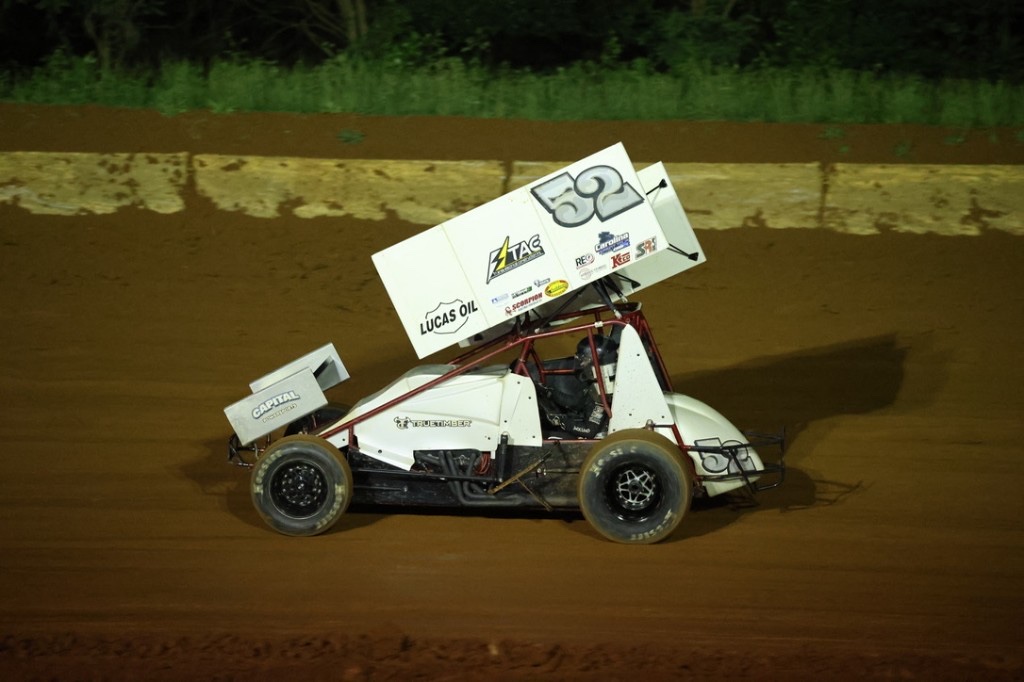 Tri-Area Electric sponsored #52 sprint car on dirt track